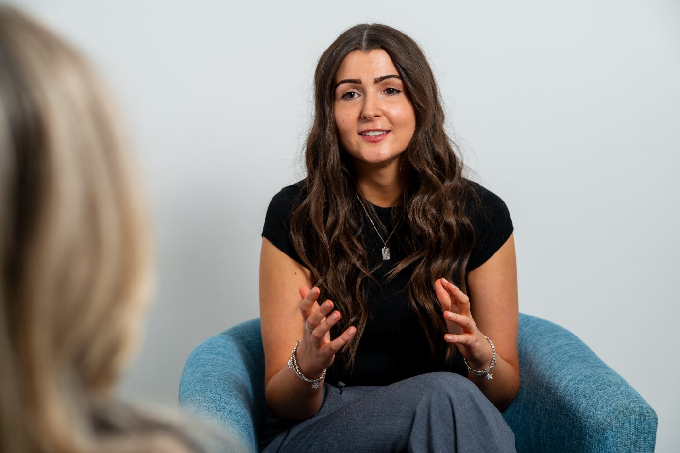 A counsellor talking with a client in a session